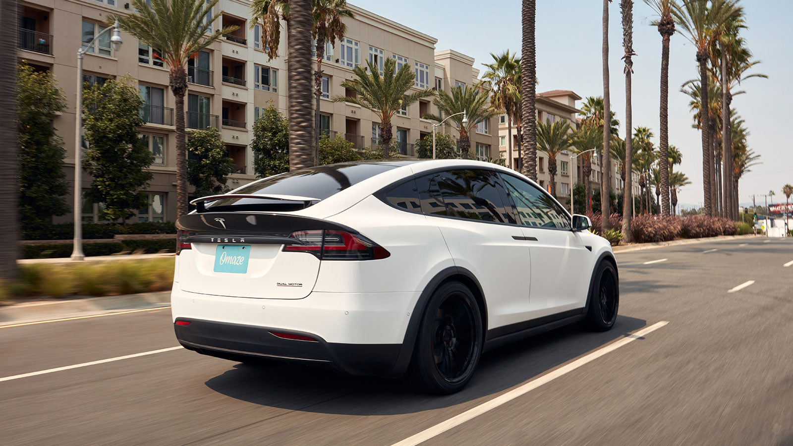 Tesla model shop x omaze