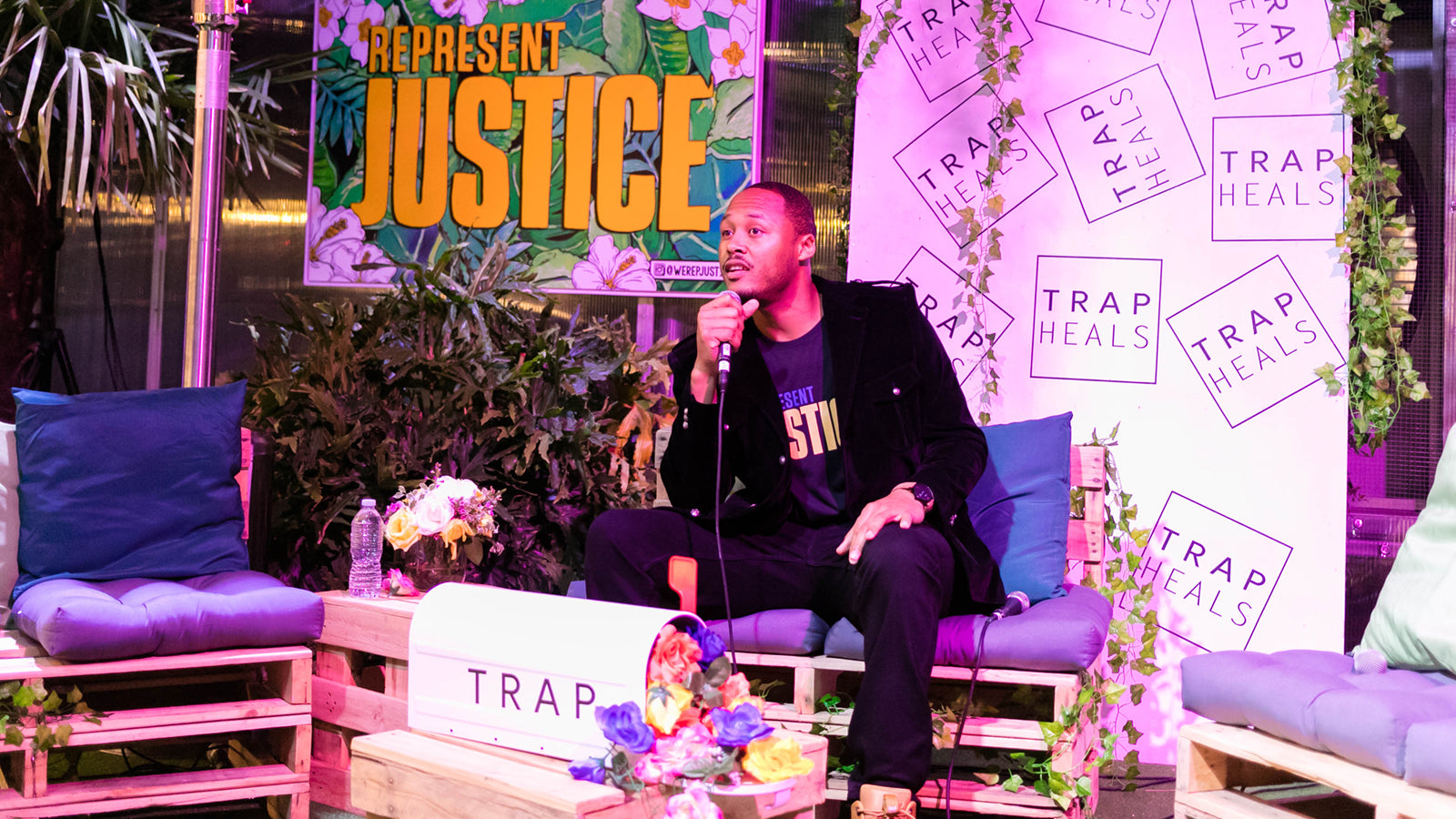 A man speaking at a Represent Justice event
